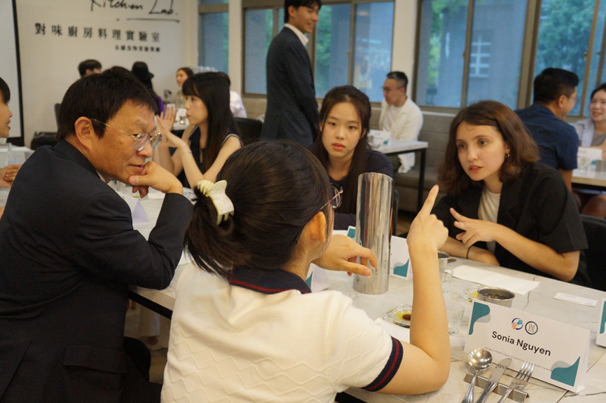 IMES students pictured with Dr. Niven Huang, Managing Director of KPMG Sustainability Consulting